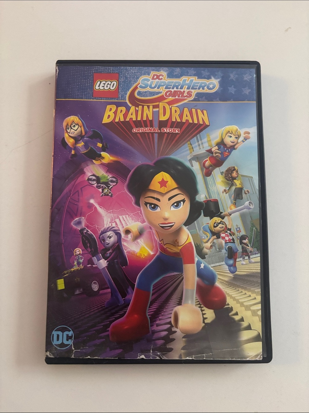 Lego DC Super Hero Girls Brain Drain DVD - Blue, Red, Purple